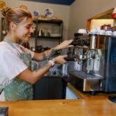 Barista at Work Skillfully Crafting the Perfect Coffee Experience in a Warm, Cozy Cafe Barista at Work Skillfully Crafting the Perfect Coffee Experience in a Warm, Cozy Cafe